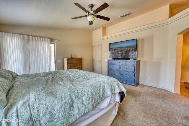 3000 Mirage Dr, Lake Havasu City, AZ 86404 - bedroom featuring arched walkways, carpet flooring, ceiling fan, and baseboards