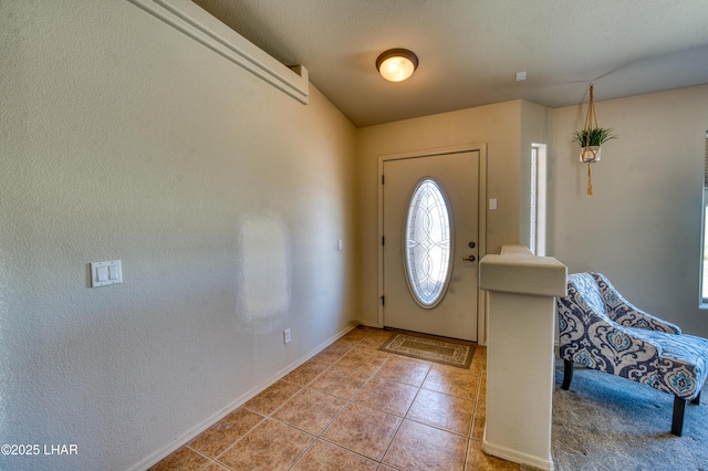 3000 Mirage Dr, Lake Havasu City, AZ 86404 - foyer entrance featuring light tile patterned flooring and baseboards