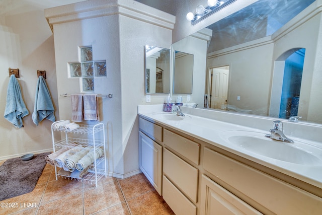 3000 Mirage Dr, Lake Havasu City, AZ 86404 - full bath featuring double vanity, tile patterned flooring, and baseboards
