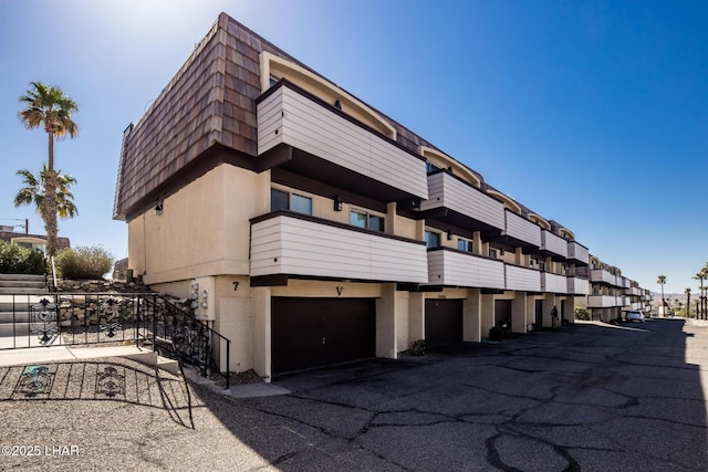 view of building exterior featuring an attached garage