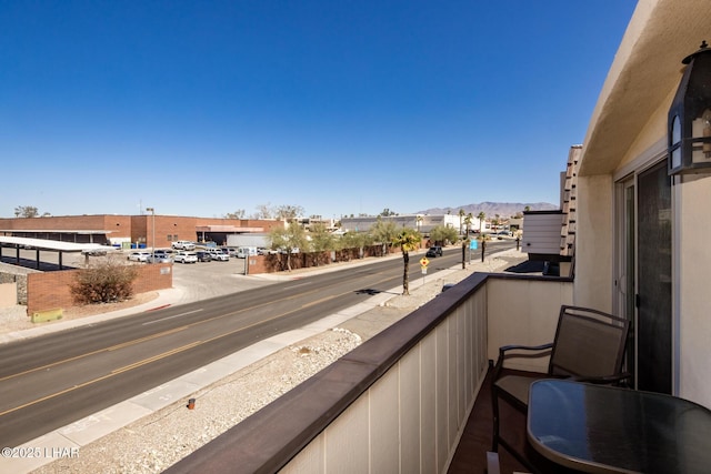 balcony featuring a mountain view