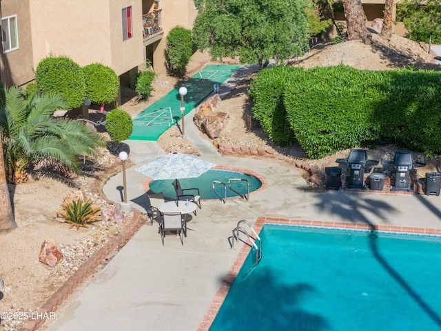 276 Lake Havasu Ave S Unit C19, Lake Havasu City, AZ 86403 - view of swimming pool with a patio area, a fenced in pool, and shuffleboard