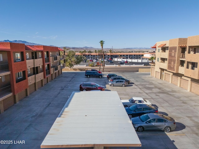 276 Lake Havasu Ave S Unit C19, Lake Havasu City, AZ 86403 - uncovered parking lot featuring a mountain view