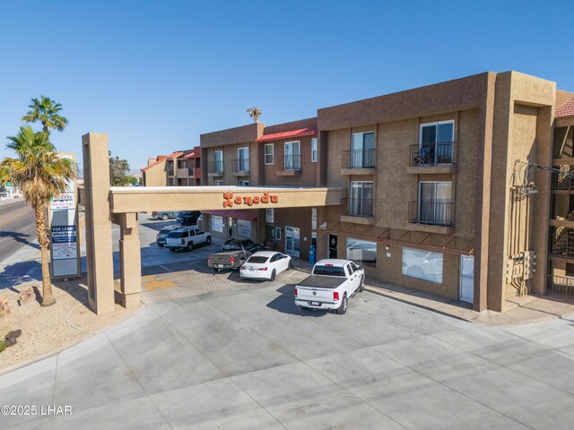 276 Lake Havasu Ave S Unit C19, Lake Havasu City, AZ 86403 - view of property with covered and uncovered parking