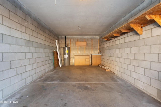 276 Lake Havasu Ave S Unit C19, Lake Havasu City, AZ 86403 - below grade area with a garage, concrete block wall, and water heater