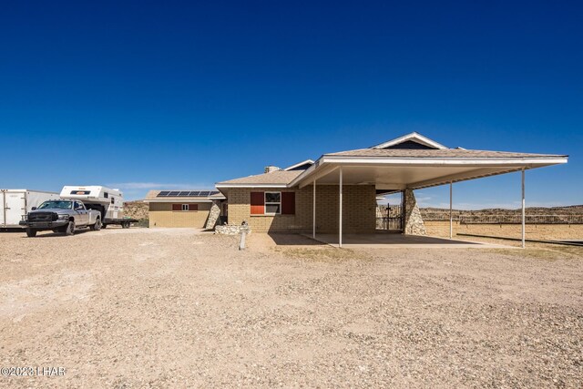 view of front facade featuring a carport