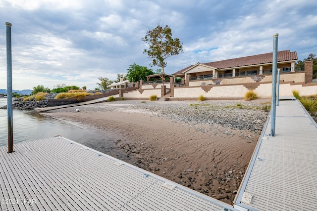 exterior space with a water view