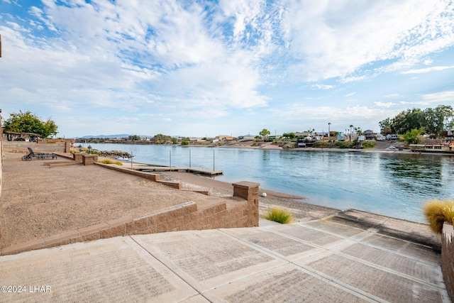 view of water feature with a boat dock