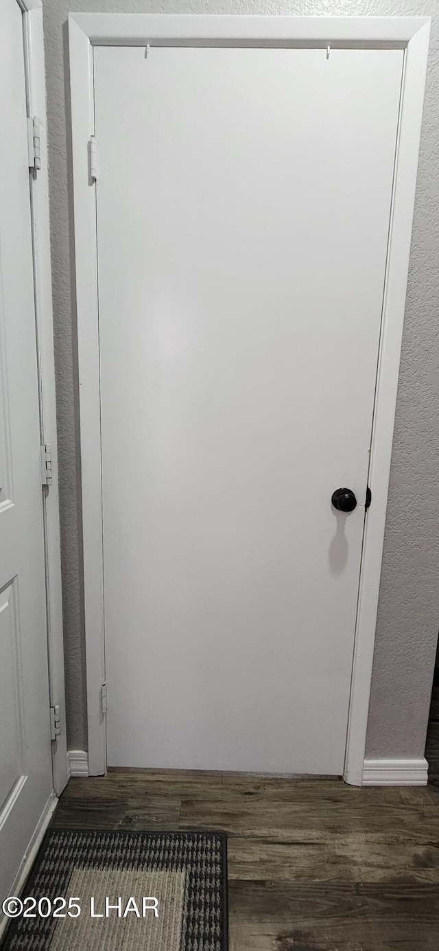 1650 Smoketree Ave S Unit 135, Avenue, Lake Havasu City, AZ 86403 - detailed view of wood finished floors and a textured wall