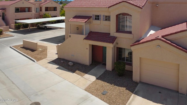 1650 Smoketree Ave S Unit 135, Avenue, Lake Havasu City, AZ 86403 - view of patio featuring an attached garage