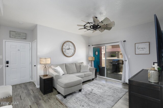 1650 Smoketree Ave S Unit 135, Avenue, Lake Havasu City, AZ 86403 - living room with ceiling fan and light wood finished floors