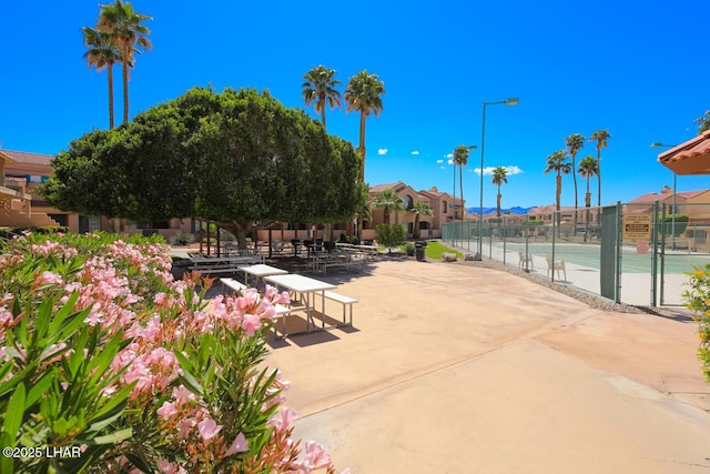 1650 Smoketree Ave S Unit 135, Avenue, Lake Havasu City, AZ 86403 - view of community featuring a tennis court and a residential view