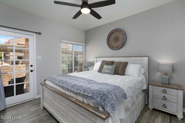 1650 Smoketree Ave S Unit 135, Avenue, Lake Havasu City, AZ 86403 - bedroom with wood finished floors, access to exterior, and a ceiling fan