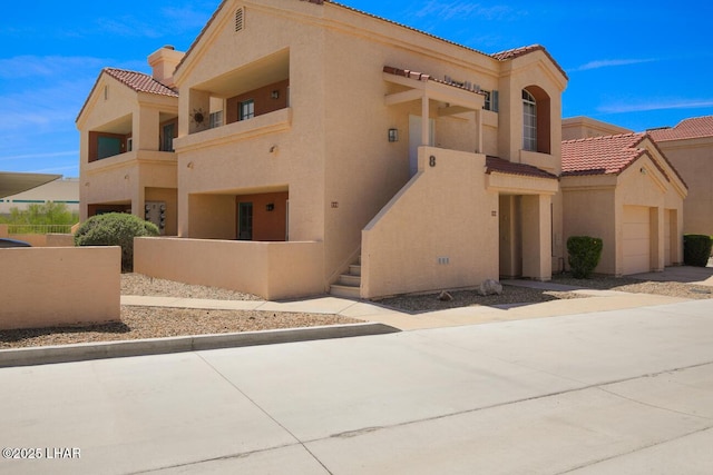 1650 Smoketree Ave S Unit 135, Avenue, Lake Havasu City, AZ 86403 - view of building exterior with a garage