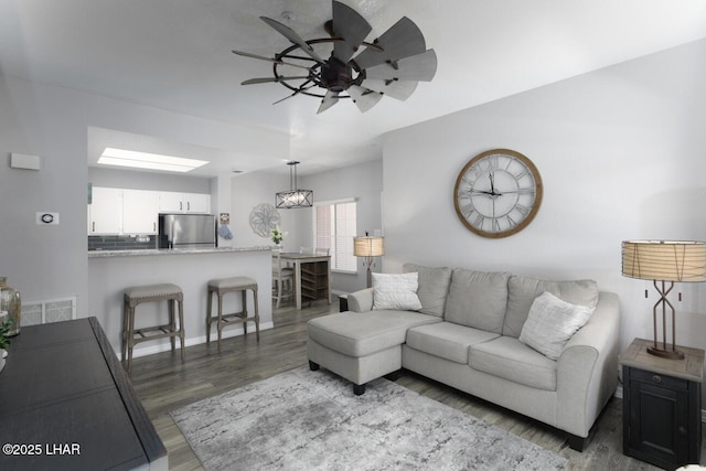 1650 Smoketree Ave S Unit 135, Avenue, Lake Havasu City, AZ 86403 - living area with wood finished floors, ceiling fan, and baseboards