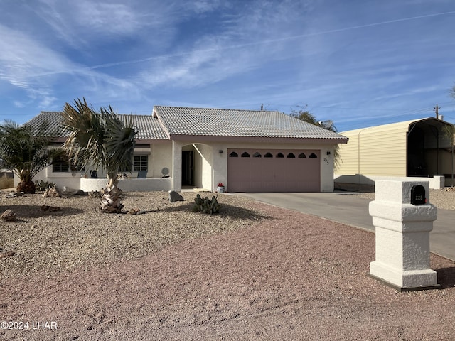 view of front of house with a garage