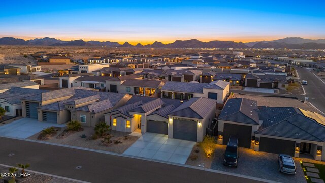 aerial view at dusk with a mountain view