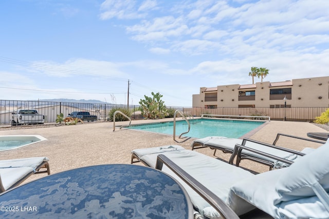 1850 Swanson Ave Unit A16, Lake Havasu City, AZ 86403 - pool with a patio, fence, and a mountain view