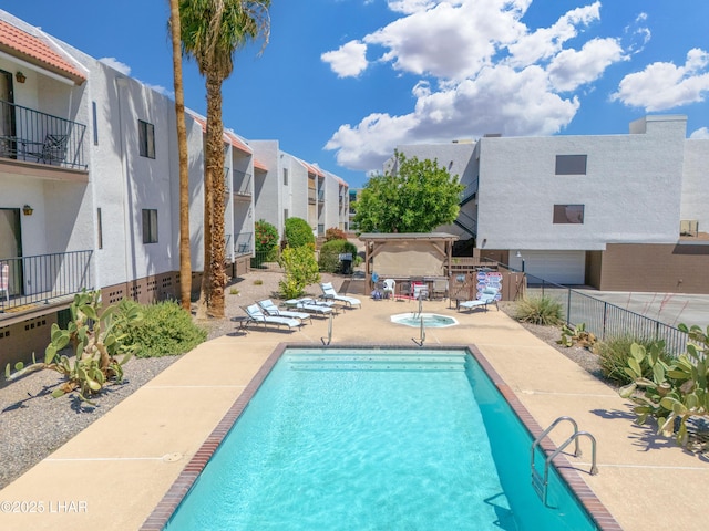 1850 Swanson Ave Unit A16, Lake Havasu City, AZ 86403 - community pool with fence, a patio area, and a residential view