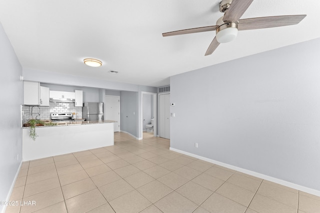 1850 Swanson Ave Unit A16, Lake Havasu City, AZ 86403 - unfurnished living room featuring ceiling fan, baseboards, and visible vents
