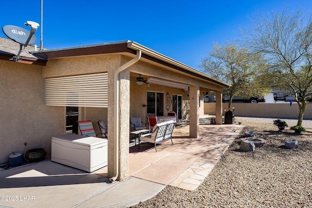 view of patio / terrace with ceiling fan