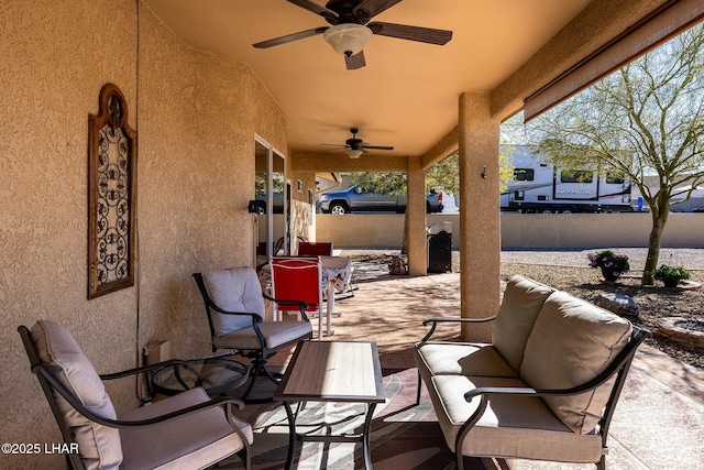 view of patio with ceiling fan