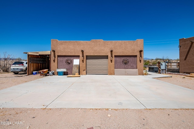 view of property exterior featuring a garage