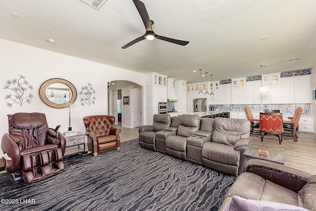 2800 Papeete Dr, Lake Havasu City, AZ 86404 - living area with arched walkways, visible vents, and a ceiling fan