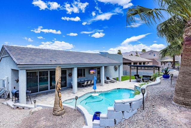 2800 Papeete Dr, Lake Havasu City, AZ 86404 - pool featuring a patio area, fence, outdoor dining area, and area for grilling