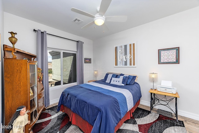 2800 Papeete Dr, Lake Havasu City, AZ 86404 - bedroom with visible vents, baseboards, and wood finished floors