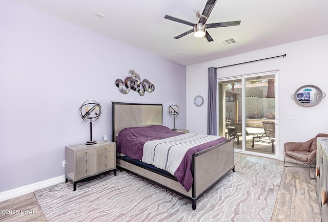 2800 Papeete Dr, Lake Havasu City, AZ 86404 - bedroom with visible vents, baseboards, a ceiling fan, light wood finished floors, and access to exterior