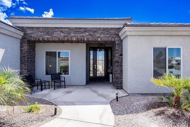 2800 Papeete Dr, Lake Havasu City, AZ 86404 - entrance to property featuring stone siding, metal roof, a standing seam roof, and stucco siding