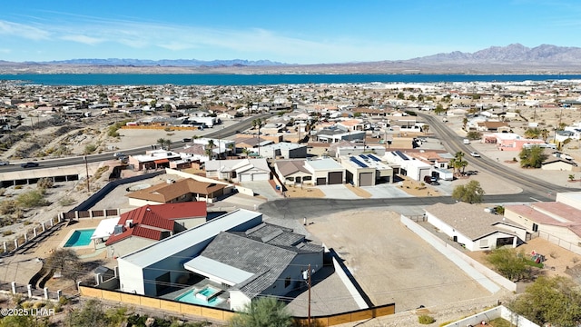 bird's eye view featuring a residential view and a mountain view