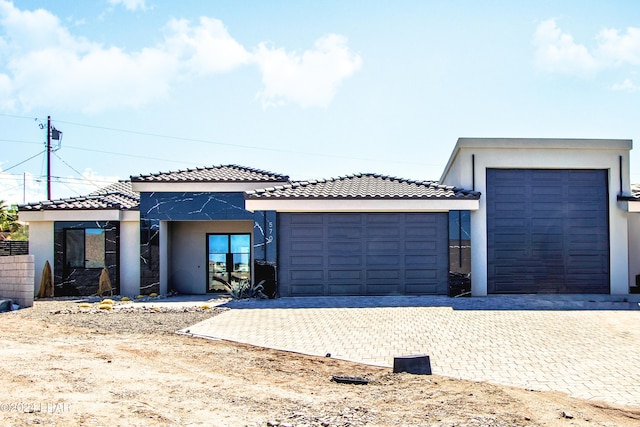 view of front of property with a garage