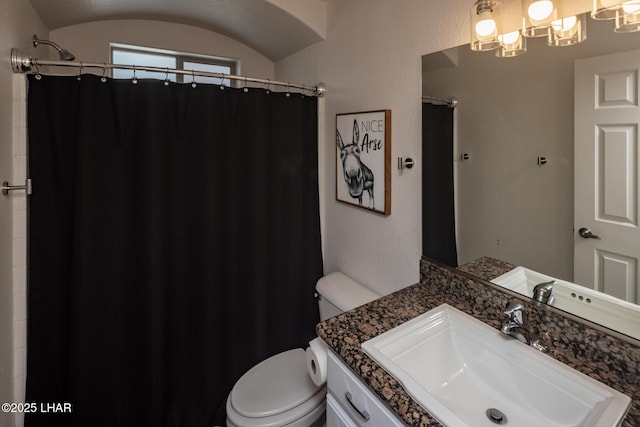 2764 Daytona Ave, Lake Havasu City, AZ 86403 - full bathroom with vanity, curtained shower, a notable chandelier, and toilet