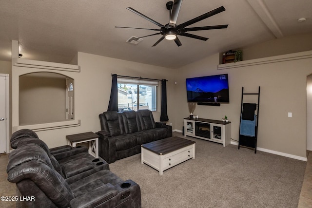 2764 Daytona Ave, Lake Havasu City, AZ 86403 - carpeted living room featuring ceiling fan, visible vents, lofted ceiling with beams, and baseboards