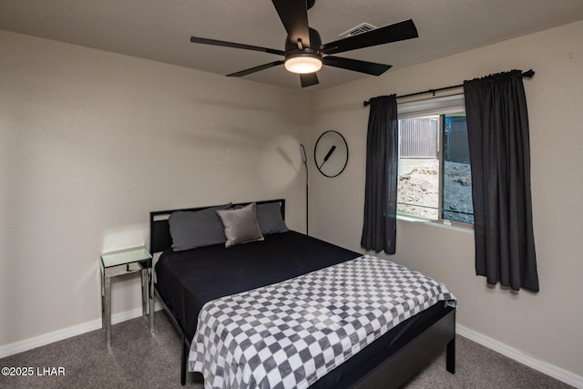 2764 Daytona Ave, Lake Havasu City, AZ 86403 - bedroom featuring dark colored carpet, baseboards, ceiling fan, and visible vents