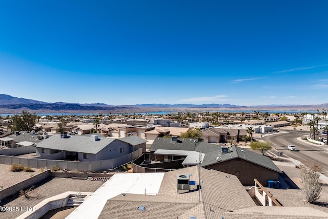 birds eye view of property with a residential view and a mountain view