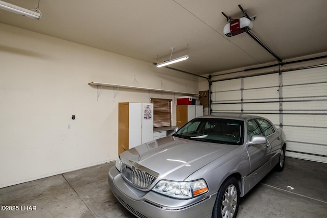 garage featuring a garage door opener