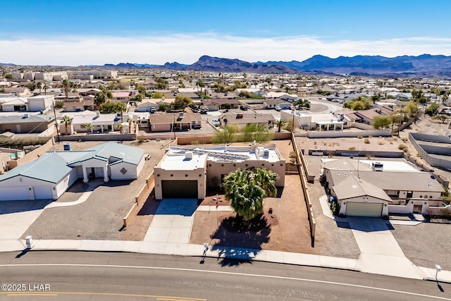aerial view with a mountain view and a residential view