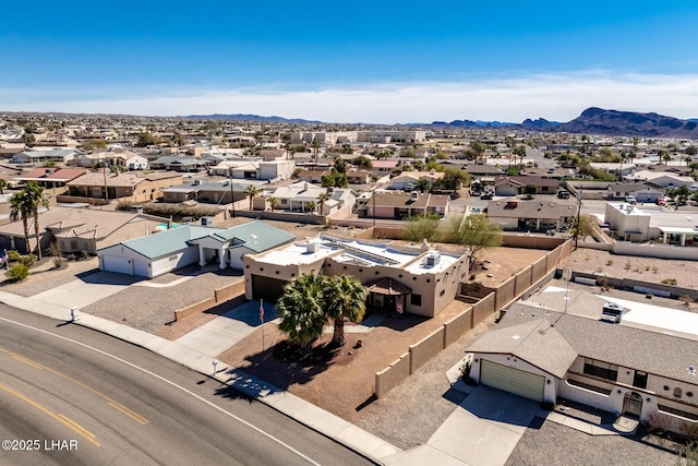 aerial view featuring a mountain view and a residential view