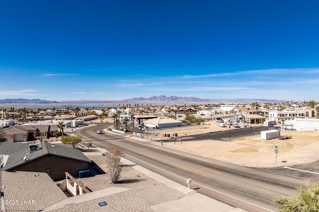 drone / aerial view with a residential view and a mountain view