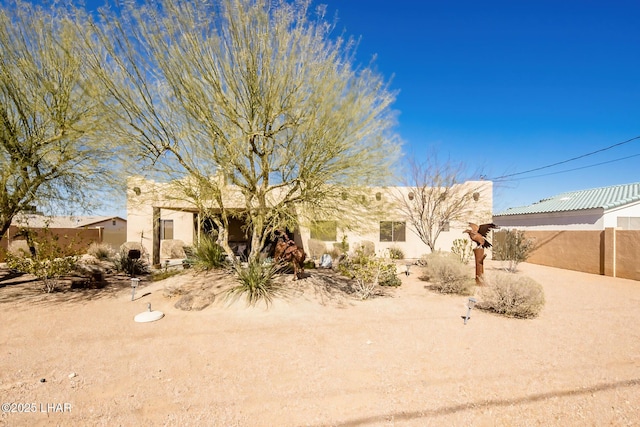 view of front of home featuring stucco siding