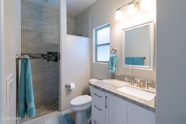 490 N Lake Havasu Ave Unit J, Lake Havasu City, AZ 86403 - bathroom with a walk in shower, toilet, and vanity