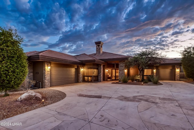 prairie-style house with a garage