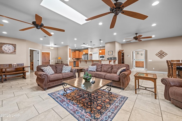 3370 Thunderhead Dr, Lake Havasu City, AZ 86406 - living area with arched walkways, a ceiling fan, light tile patterned floors, and recessed lighting