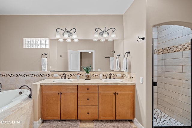 3370 Thunderhead Dr, Lake Havasu City, AZ 86406 - bathroom featuring double vanity, a garden tub, and tiled shower