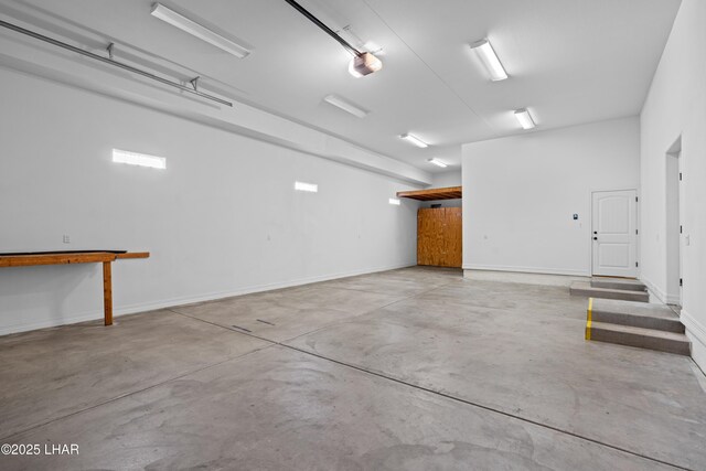 3370 Thunderhead Dr, Lake Havasu City, AZ 86406 - garage featuring a garage door opener and baseboards