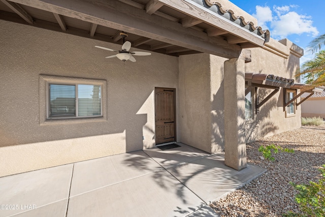 3370 Thunderhead Dr, Lake Havasu City, AZ 86406 - entrance to property with stucco siding, ceiling fan, and a patio area