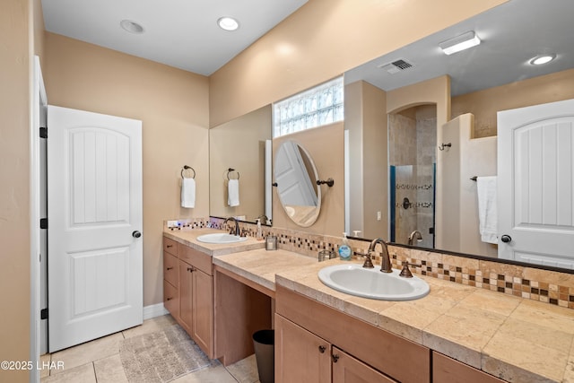 3370 Thunderhead Dr, Lake Havasu City, AZ 86406 - full bath featuring double vanity, tiled shower, tile patterned flooring, and backsplash